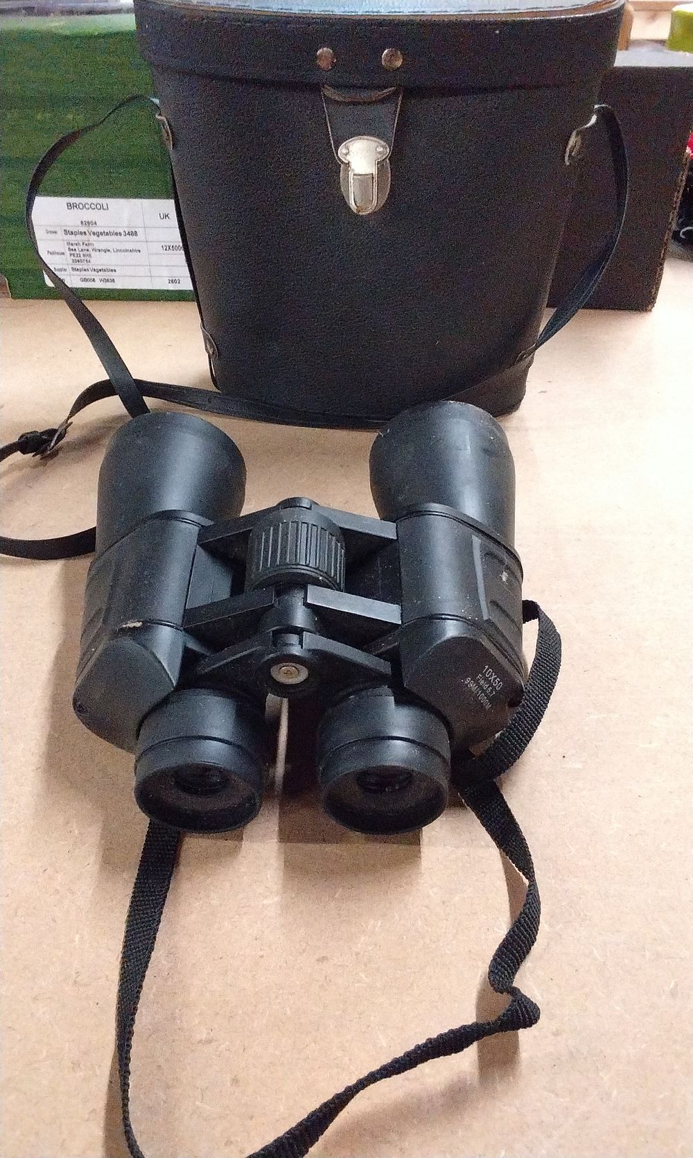 Lot 243: A Pair of Black 10x50 Binoculars with Carrying Case