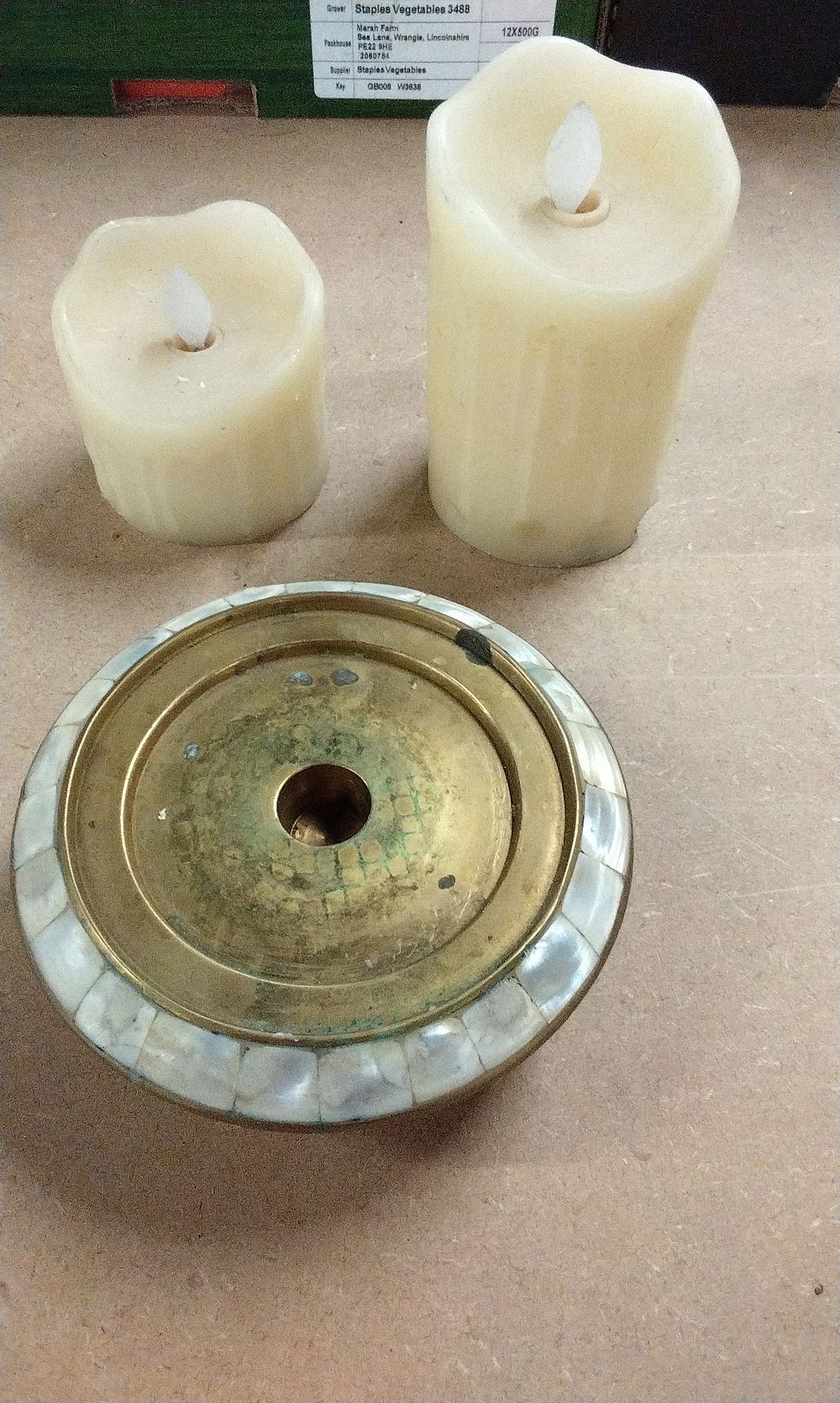 Lot 249: A Brass Mother-of-Pearl Stand and Two LED Candles