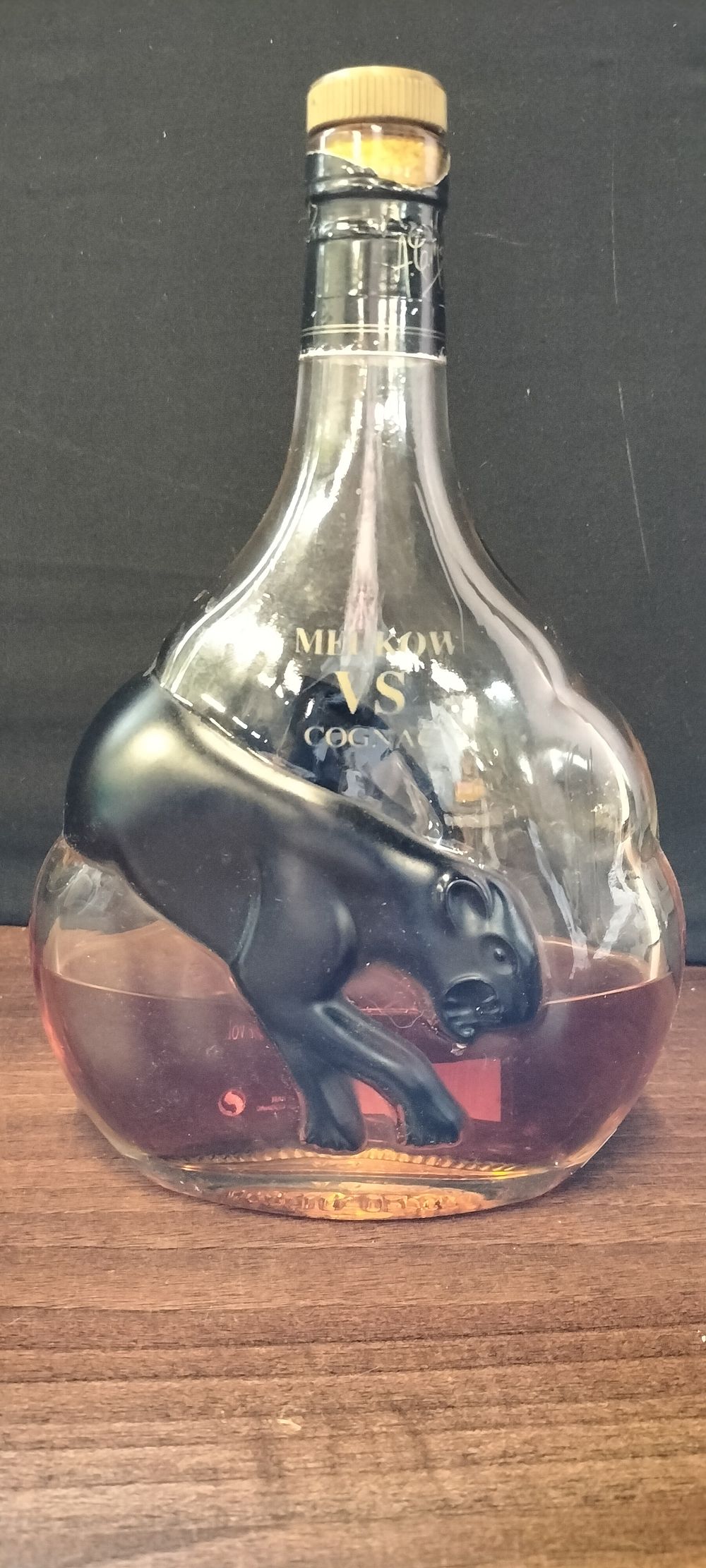 Lot 270: Meukow VS Cognac Black Panther Glass Bottle