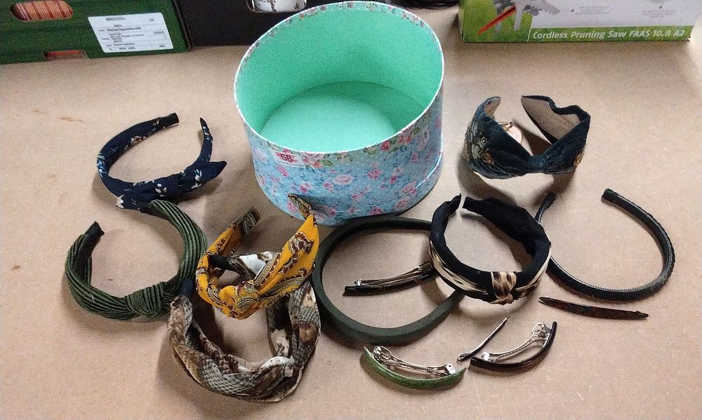 Lot 284: Assorted Headbands, Hair Clips, and Floral Box
