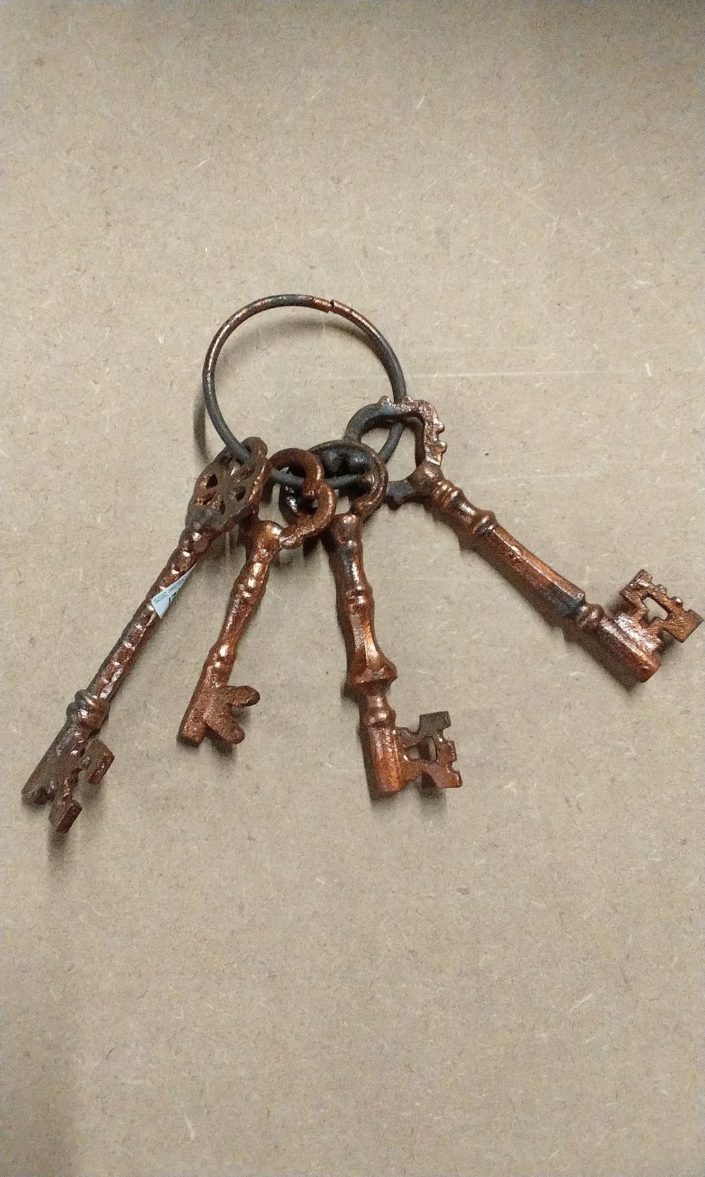 Lot 285: A Set of Five Antique-Style Cast Iron Skeleton Keys on a Ring