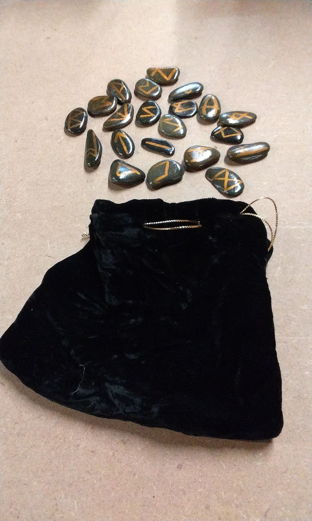 Lot 286: A Set of 24 Runic Stones with Velvet Pouch