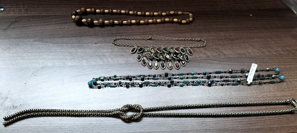 Lot 308: A Group of Four Assorted Necklaces