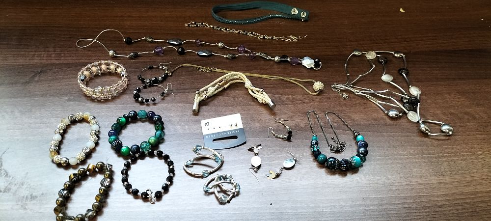 Lot 316: A mix of 14 Necklaces and Bracelet and 4 pairs of Earrings
