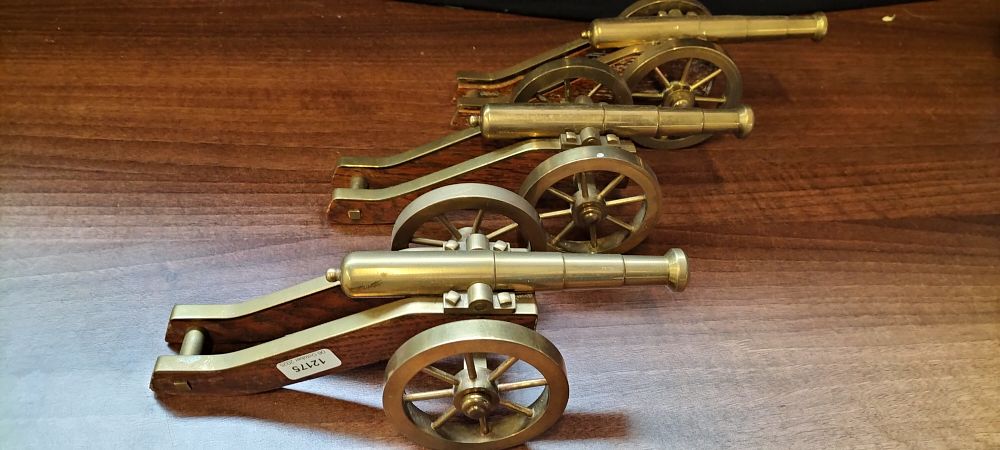 Lot 333: Three Miniature Brass and Wood Model Cannons