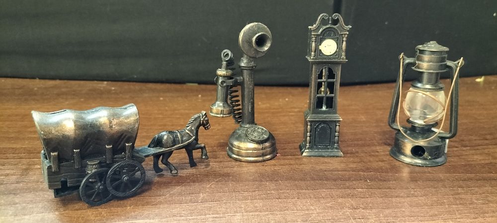 Lot 345: Four Novelty Die-Cast Bronze and Black Pencil Sharpeners