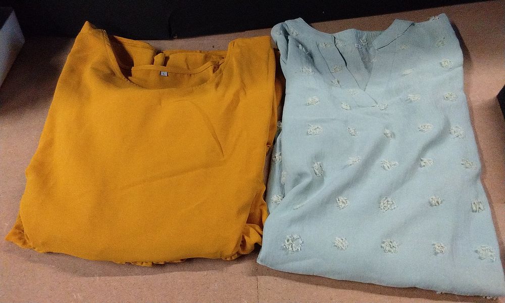 Lot 359: A Pair of Modern Women's Blouses, comprising a Mustard Yellow Tiered Tunic and a Light Blue Textured Dot Blouse