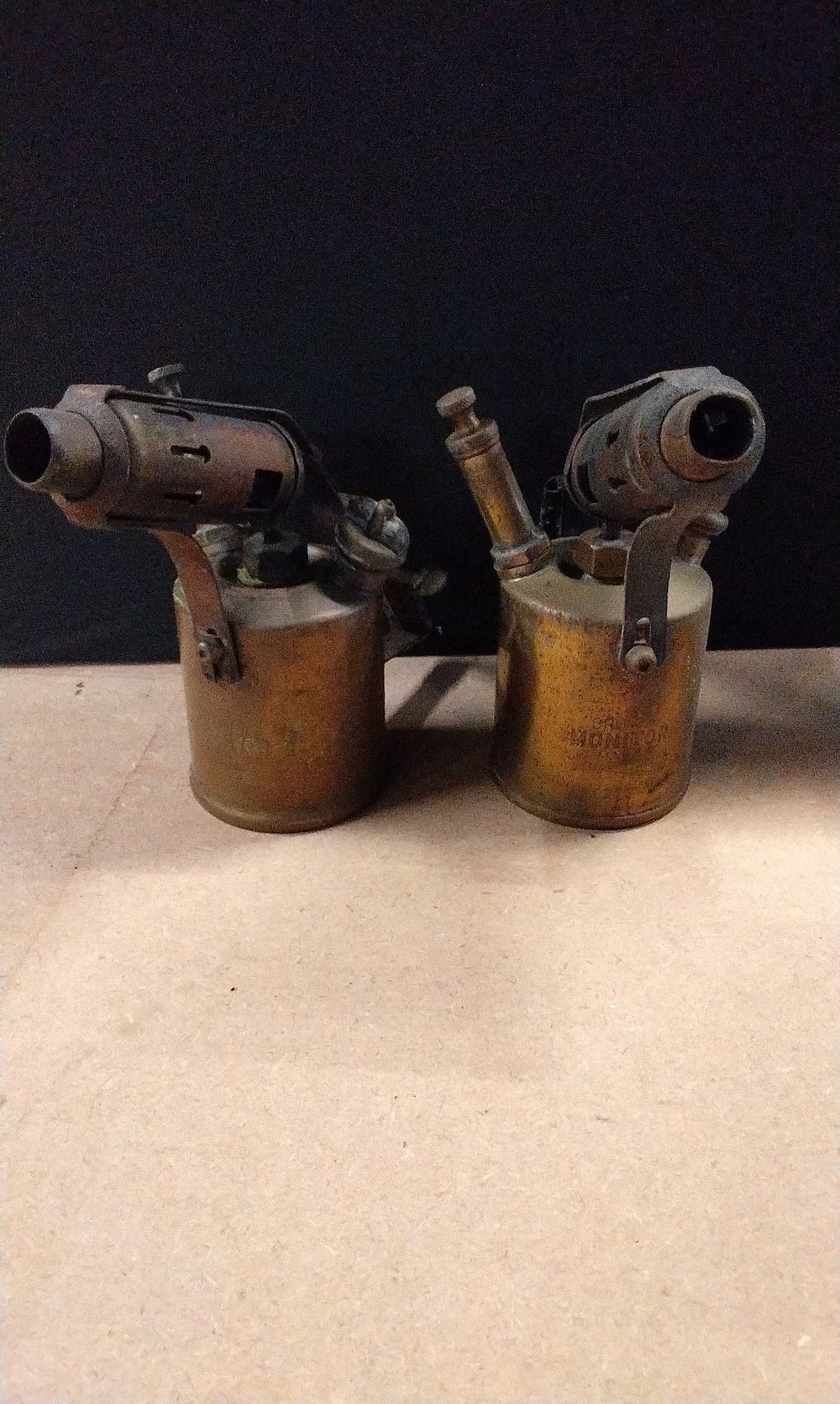 Lot 361: A Pair of Vintage Industrial Brass Blowtorches, 'Monitor' and 'British Monitor'