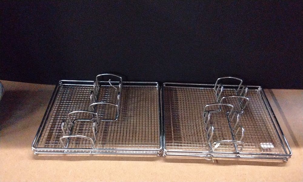 Lot 374: A Pair of Contemporary Metal  Holders