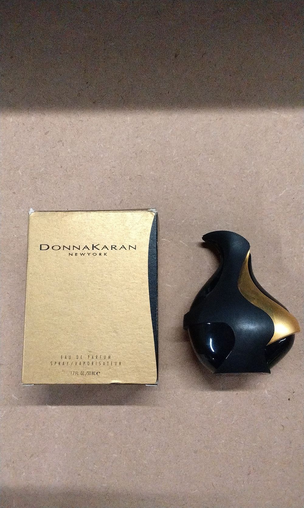 Lot 375: Donna Karan New York 'Black Swan' Eau de Parfum Spray, 1.7 FL. OZ. / 50 ML, With Box
