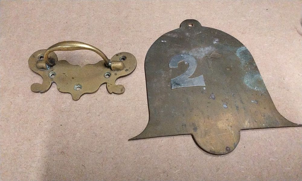 Lot 393: A Pair of Vintage Brass Drawer Pull and Numbered Bell-Shaped Plaque