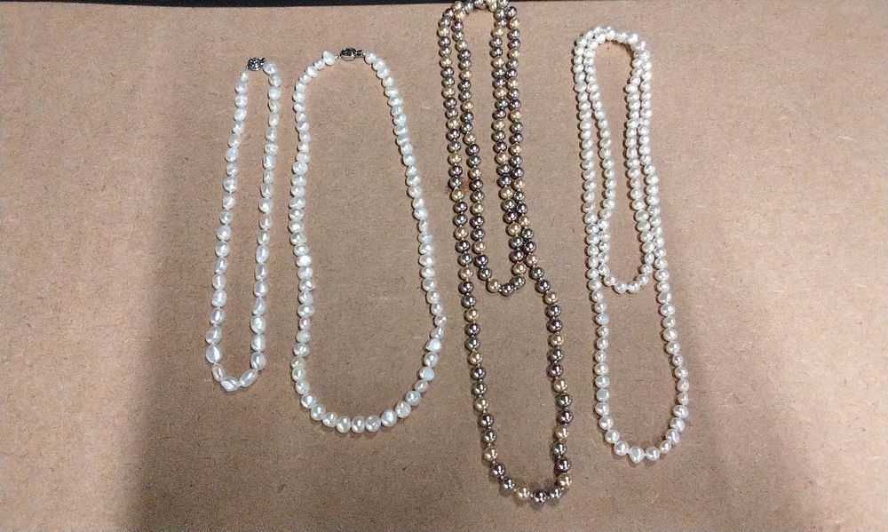 Lot 396: A Group of Four Cultured Pearl Necklaces