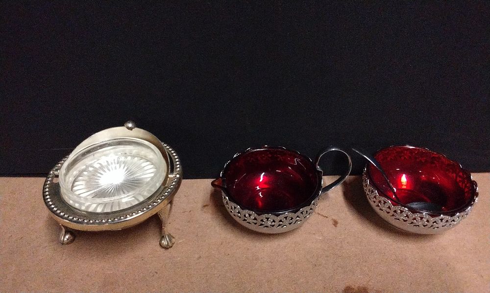 Lot 449: A Set of Silver-Toned Metal and Glass Tableware