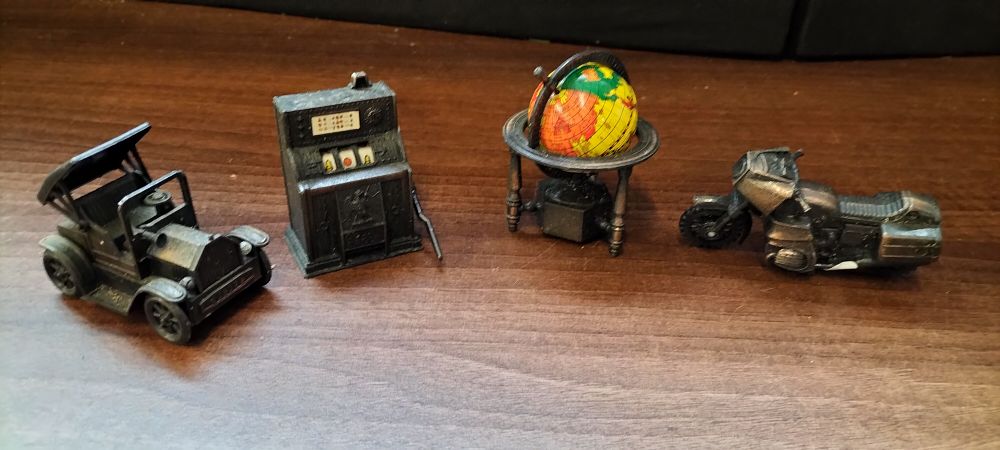 Lot 453: Four Novelty Die-Cast Miniature Pencil Sharpeners