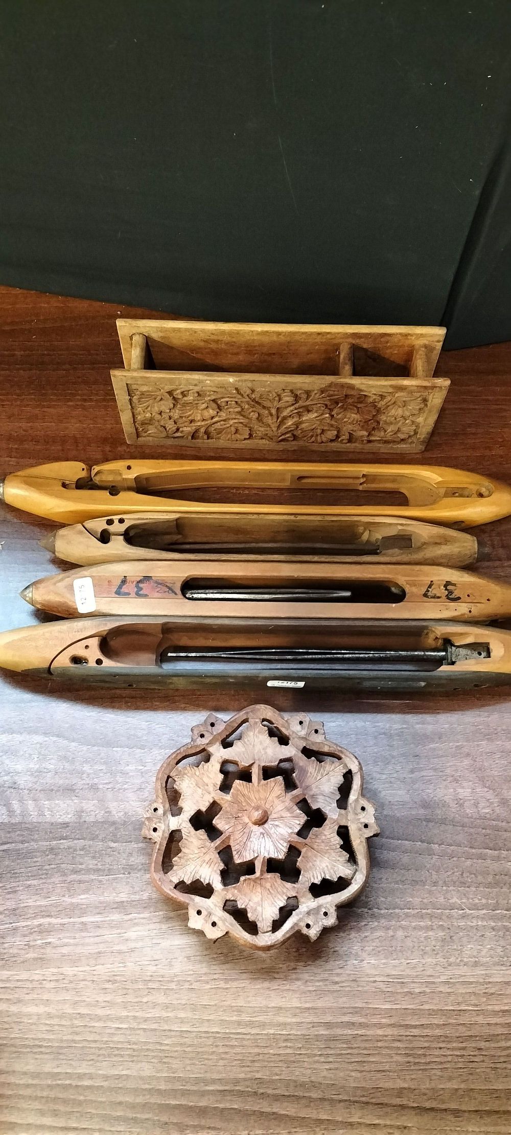 Lot 460: A Collection of Wooden Weaving Shuttles and Carved Items