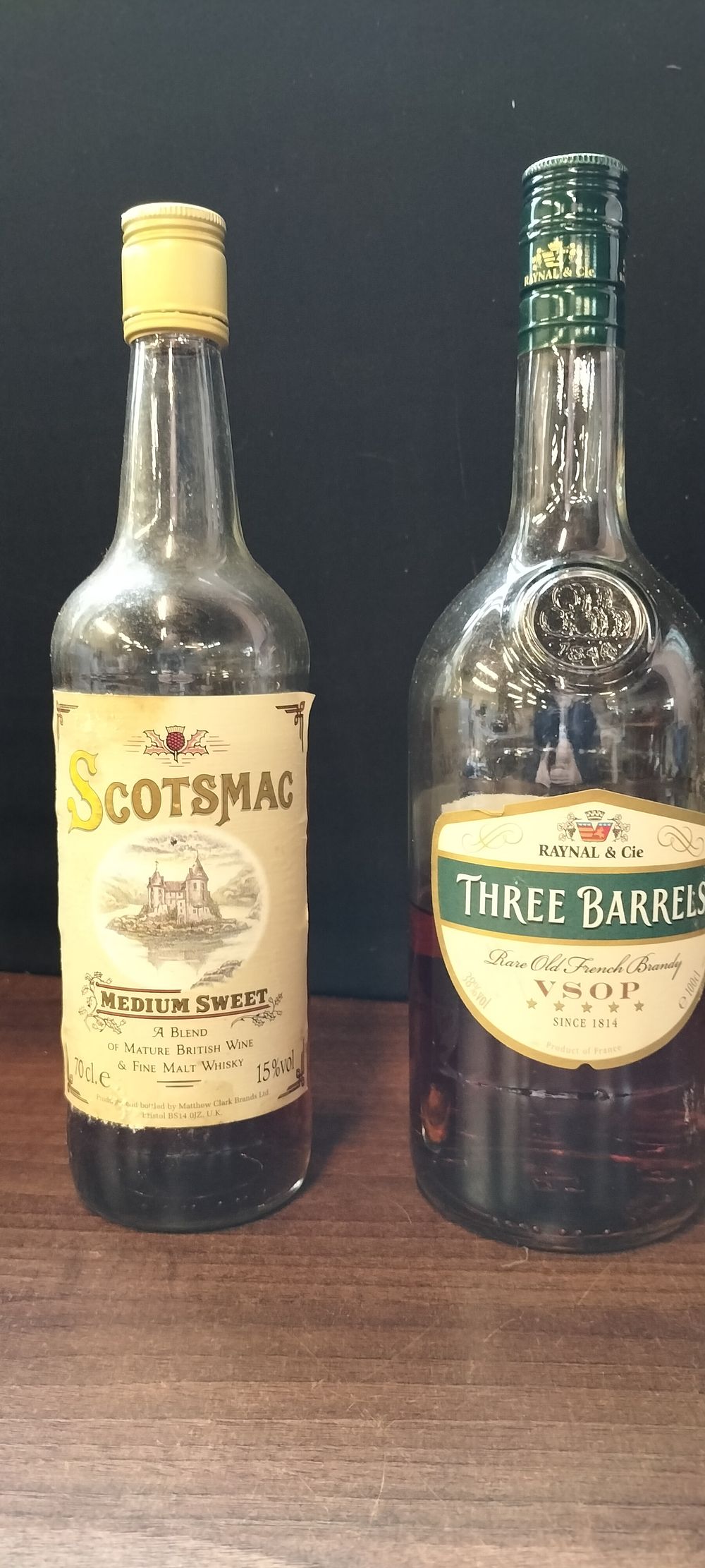 Lot 483: One Bottle of Scotsmac and One Bottle of Three Barrels Brandy