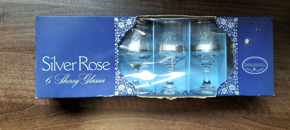 Lot 497: A Set of Six Coloroll Silver Rose Sherry Glasses