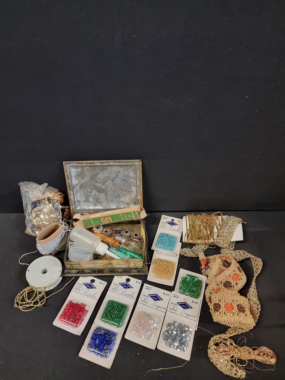 Lot 666: A Collection of Craft Supplies: Tin, Beads, Sequins, Trim, Appliqué