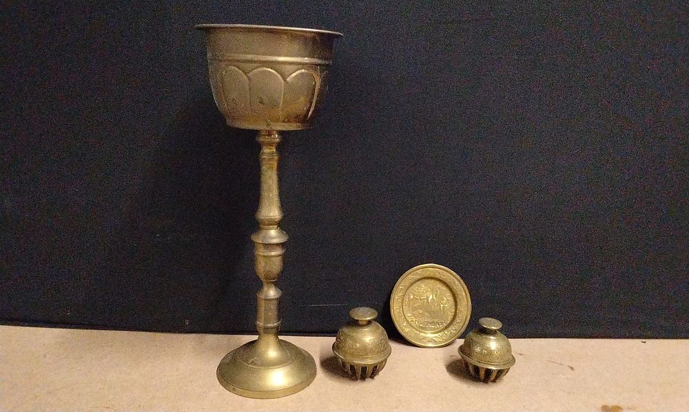 Lot 622: A Group of Four Brass Decorative Items