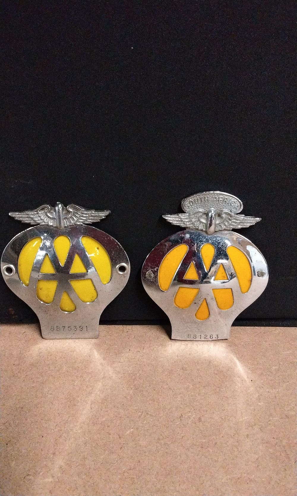 Lot 626: A Pair of Vintage AA Silver and Yellow Car Grill Badges