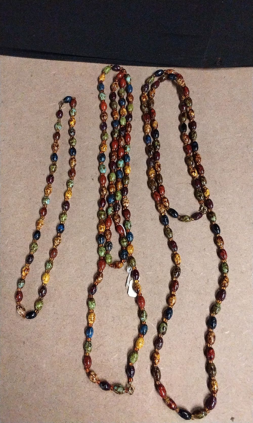 Lot 649: Three Multi-Colored Speckled Czech Glass Beaded Necklaces