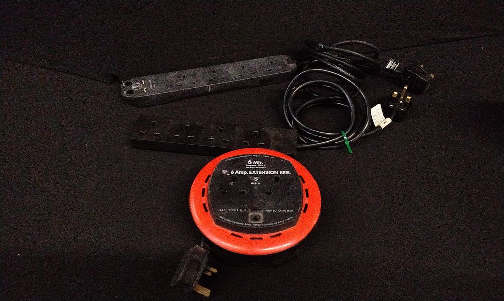 Lot 667: Three Extension Reel and Power Strips