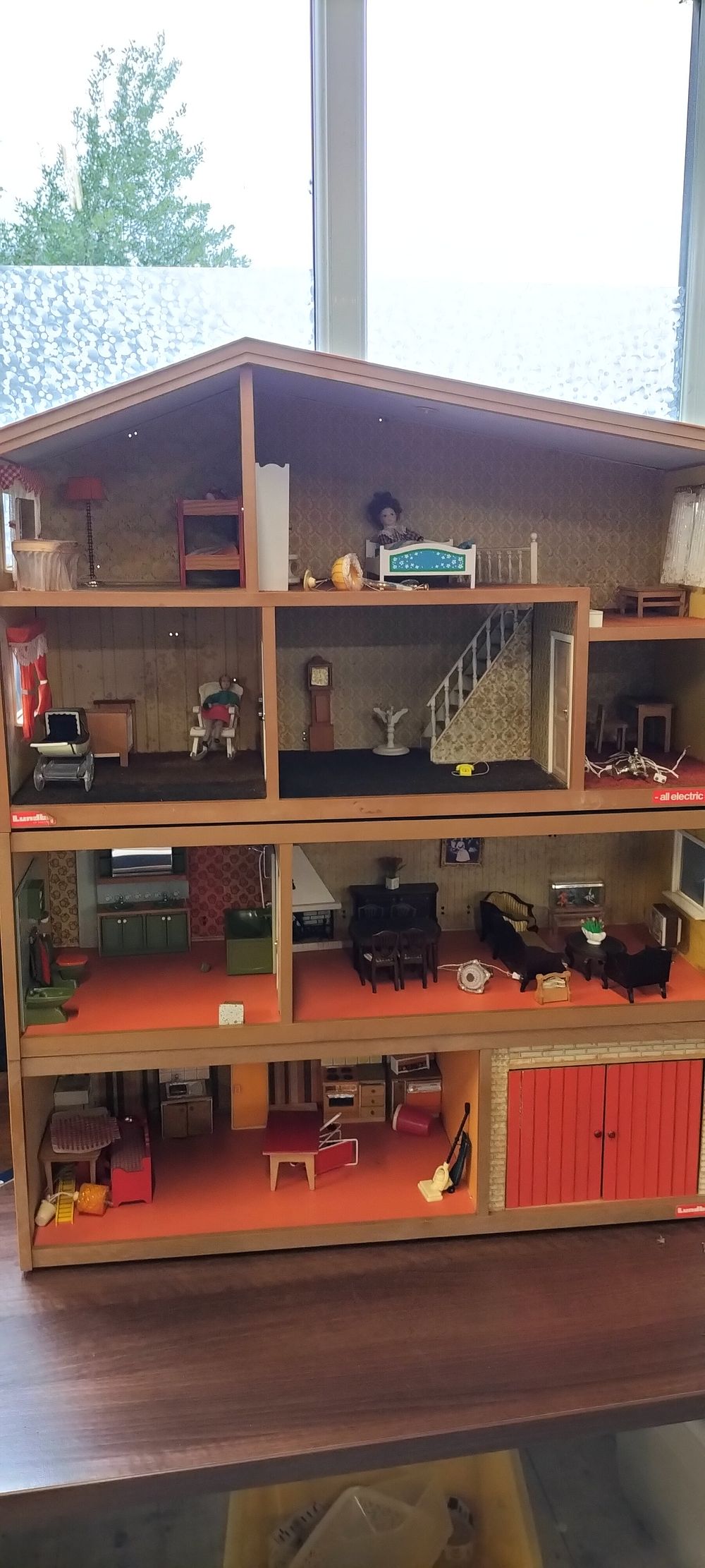Lot 697: Lundby All Electric Dollhouse with Furniture, Two Dolls, Accessories