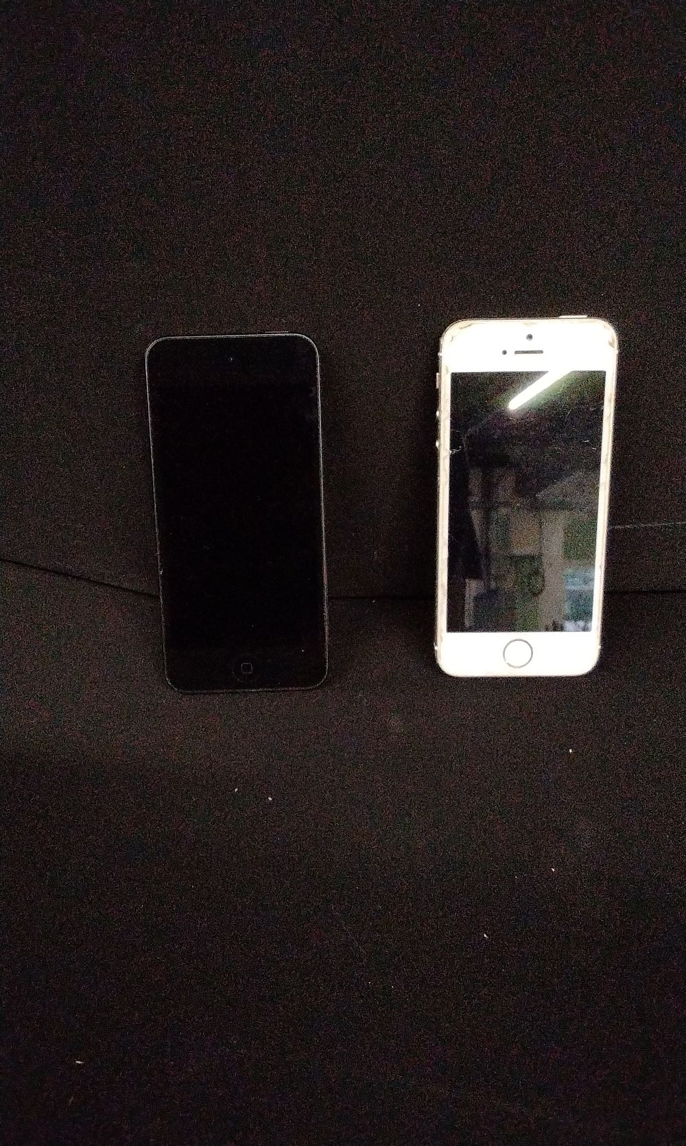 Lot 717: Two Apple iPod Touch and iPhone Mobile Devices. No Power Supply