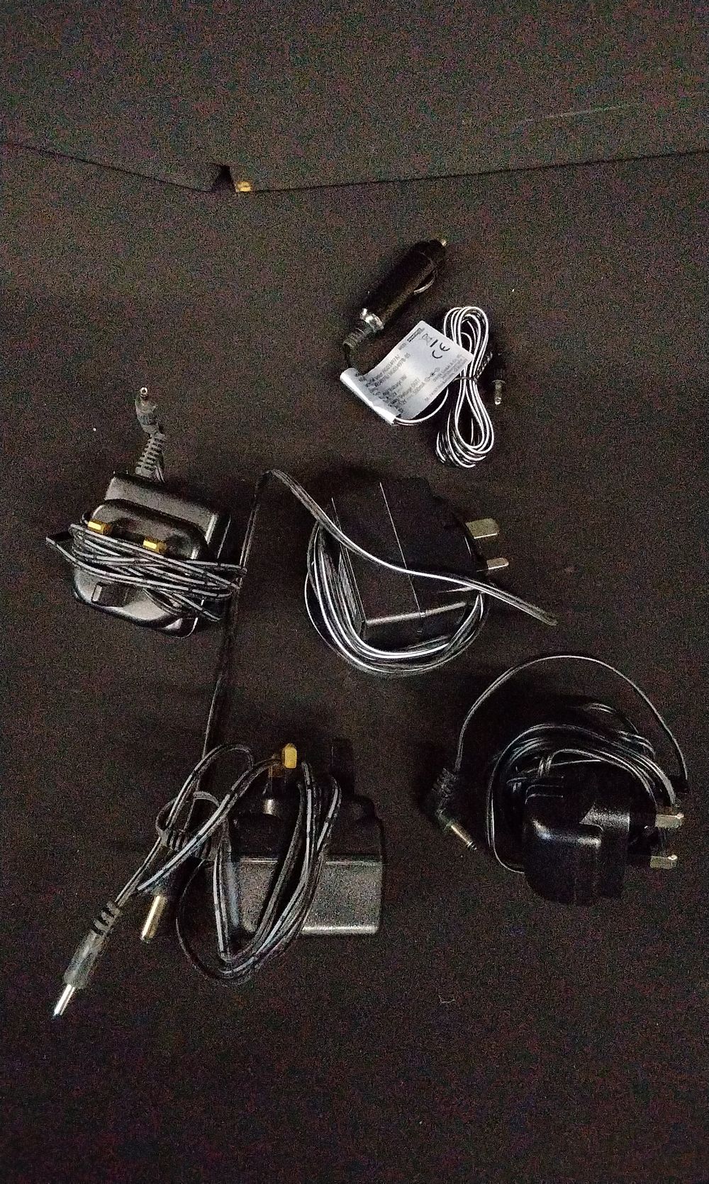 Lot 720: A Group of Five  Power Adapters and Chargers