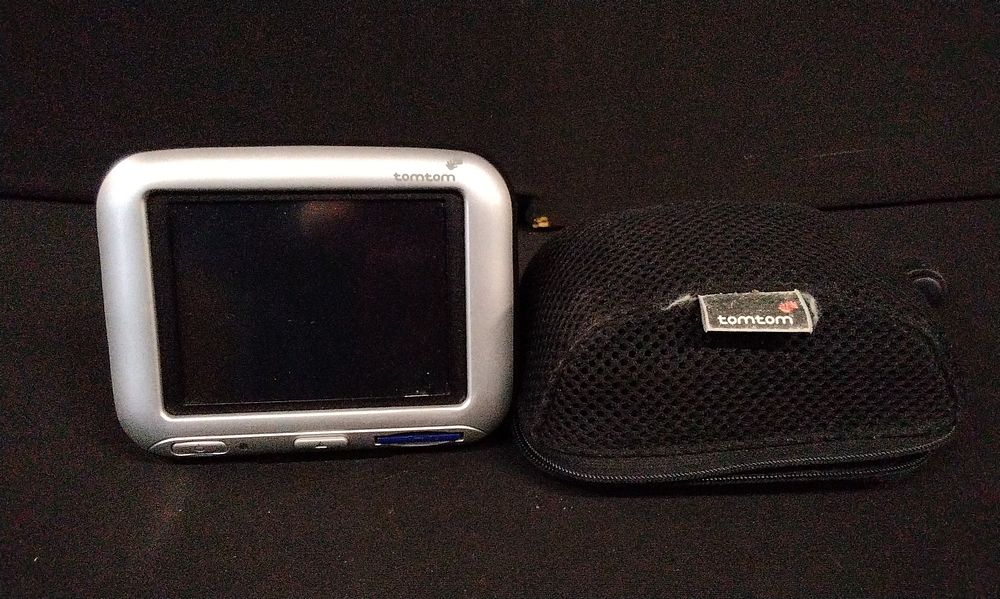Lot 722: A TomTom GO 300 Portable GPS Device and Case. No Power Supply