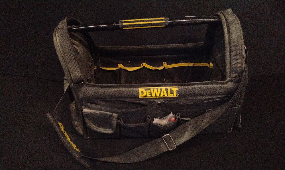 Lot 747: A DeWalt Black and Yellow Open-Top Tool Tote
