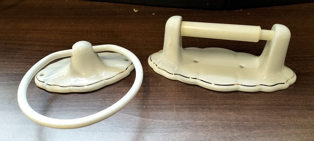 Lot 753: A Pair of Cream Ceramic Gold Trim Towel Ring and Toilet Paper Holder