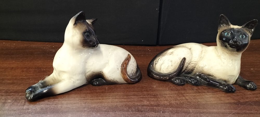 Lot 770: Two Beswick Siamese Cat Figurines