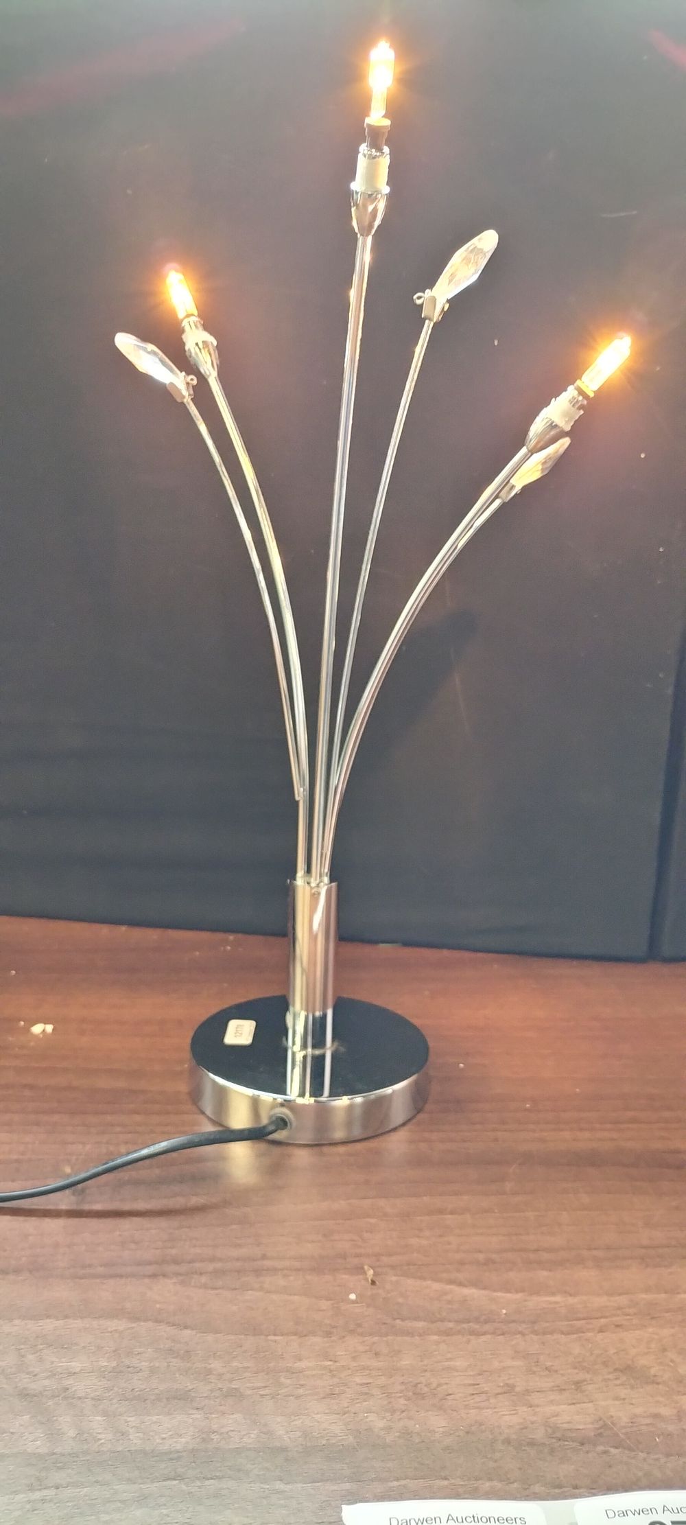Lot 591: A Silver-Toned Multi-Stemmed Table Lamp