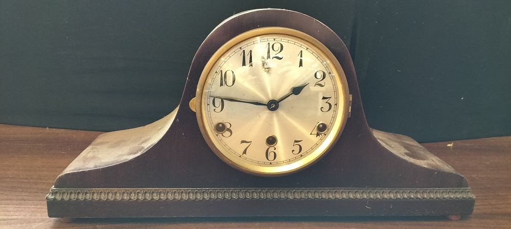 Lot 611: German Dark Brown Wooden Chiming Mantel Clock