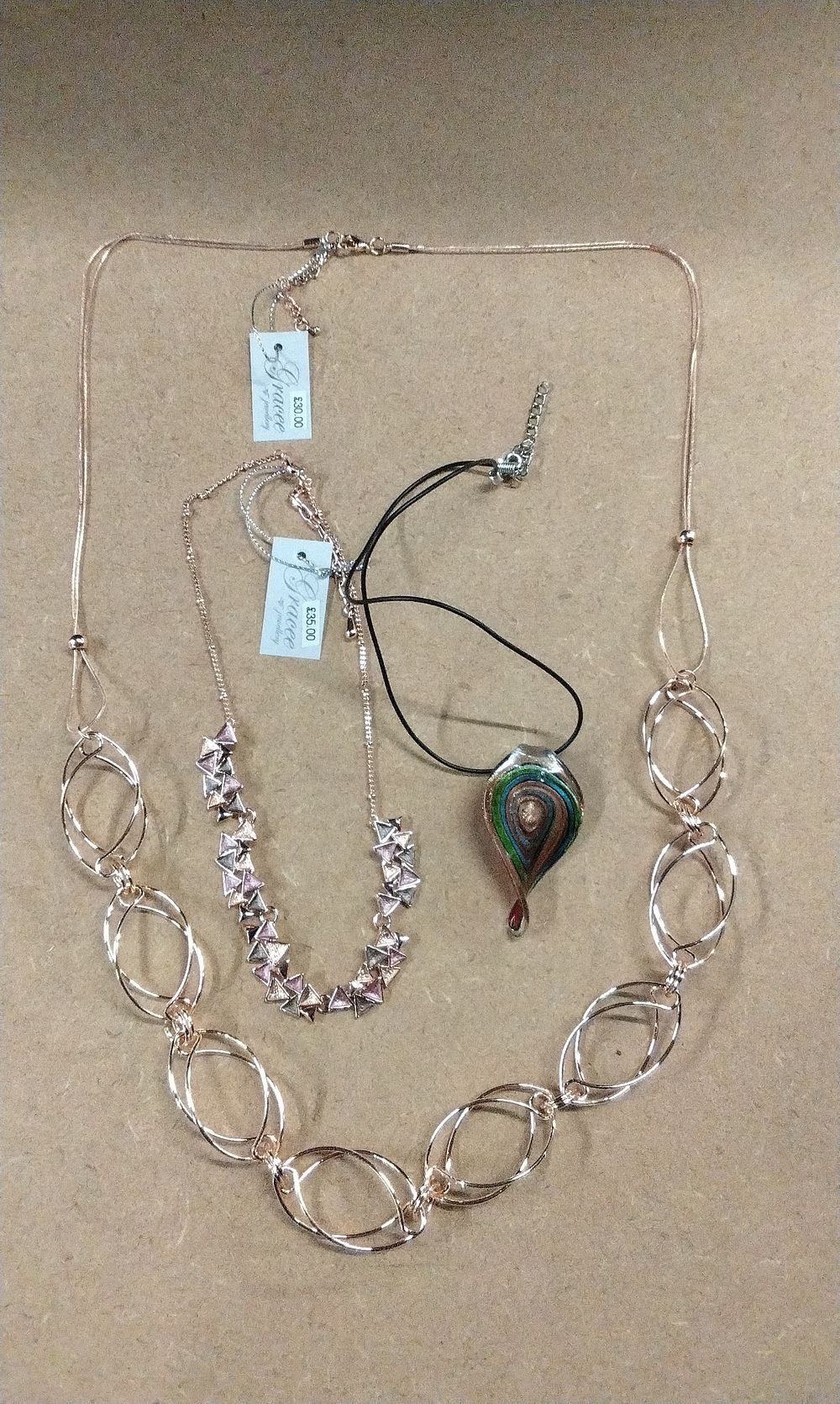 Lot 626: Three Contemporary Costume Necklaces, including two by Grace Jewellery