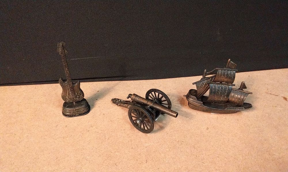 Lot 656: Three Miniature Pencil Sharpeners