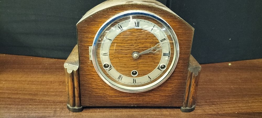 Lot 665: A British Anvil Art Deco Wooden Mantel Clock