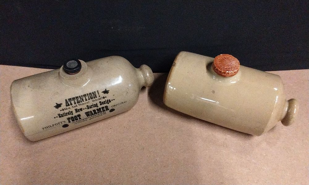 Lot 676: Two Vintage footwarmers one is a Philpott's Ceramic Stoneware Foot Warmer