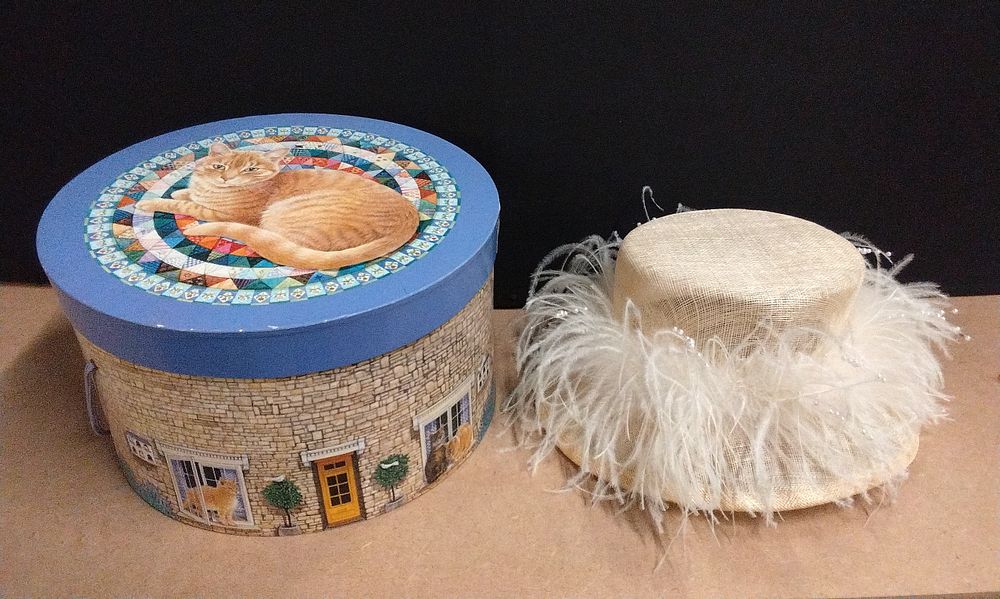 Lot 680: A Decorative Box and Ladies' Feather Hat