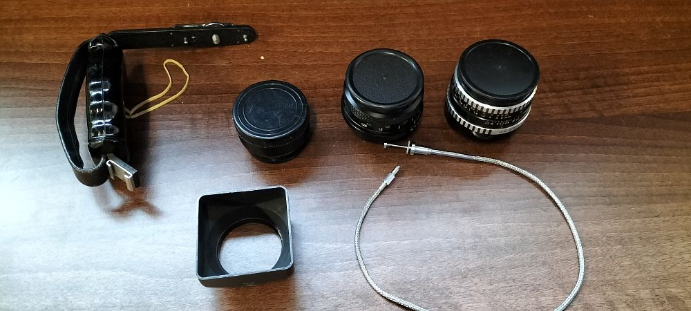Lot 693: A Collection of Camera Lenses and Accessories