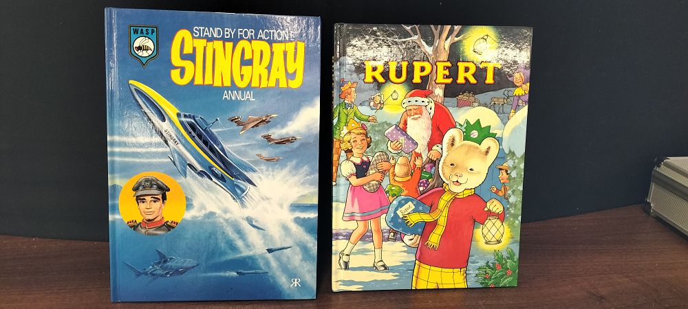 Lot 696: Stingray and Rupert Annual Books