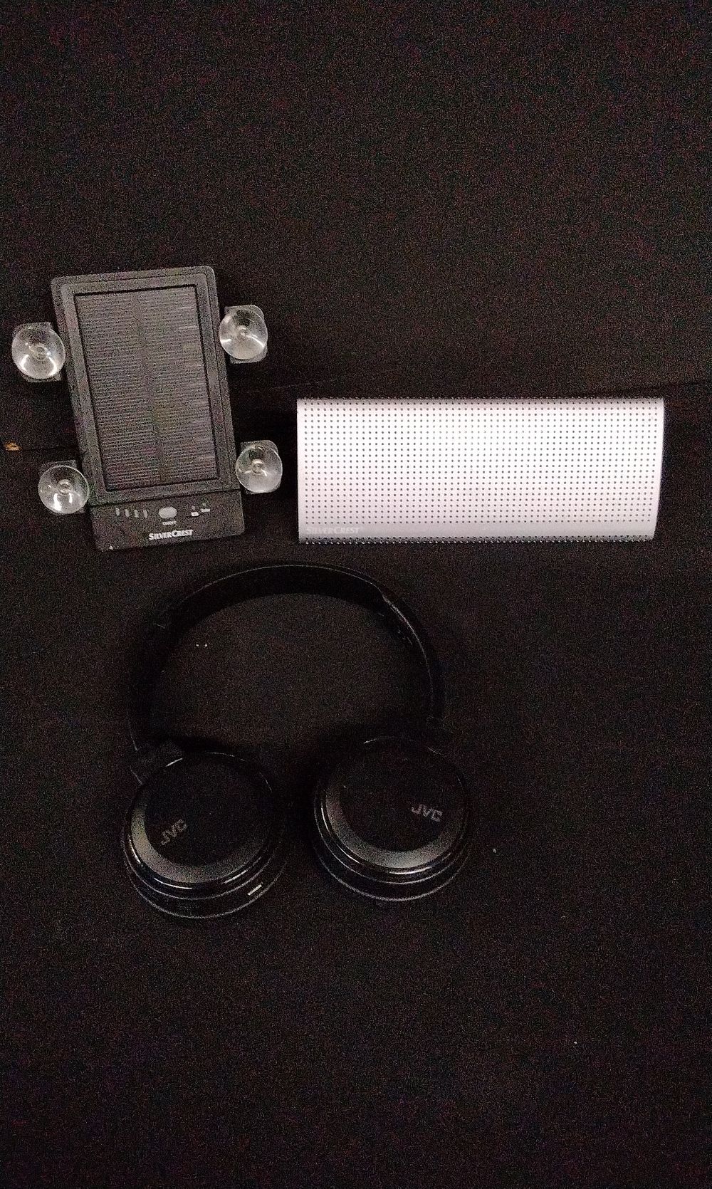 Lot 702: SilverCrest Power Bank, Bluetooth Speaker, and JVC Headphones. No Power Supply