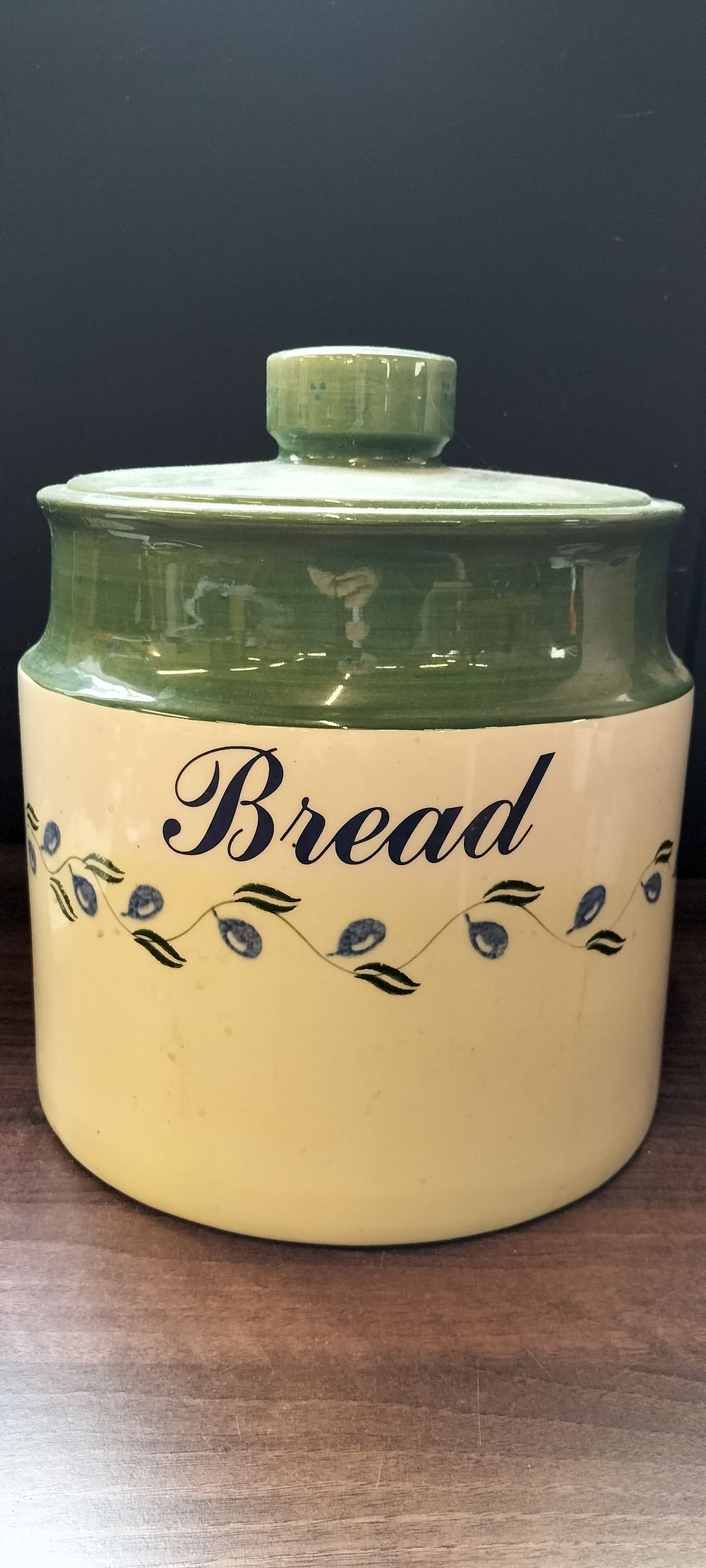 Lot 717: A Cream and Green Ceramic Lidded Bread Crock