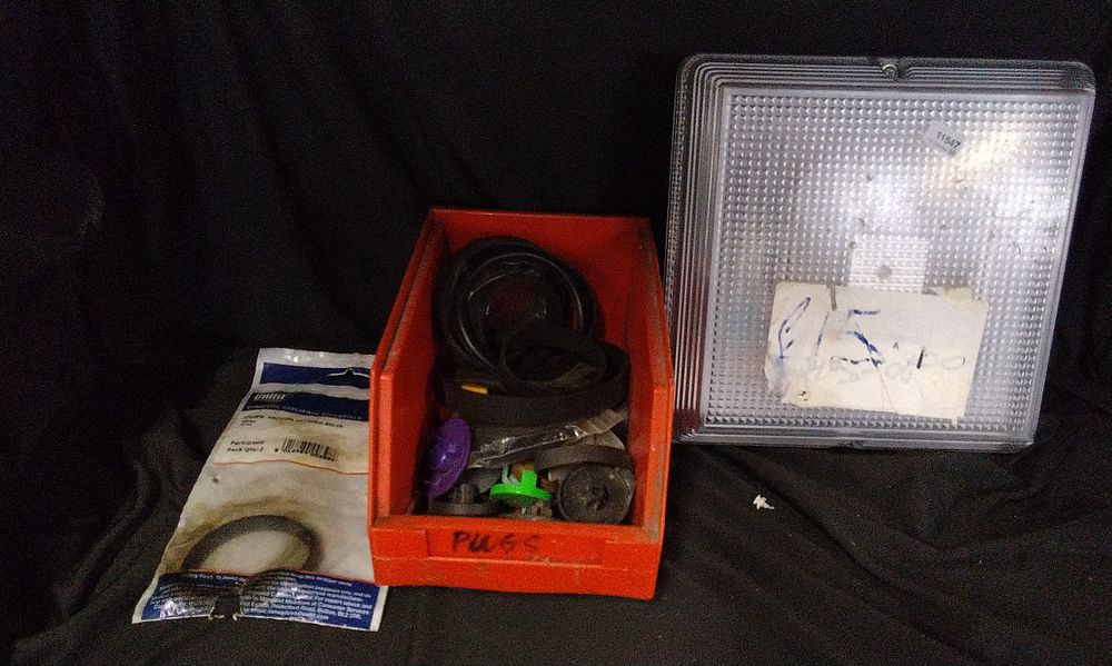 Lot 806: Box of Vacuum cleaner Belts, wired Outdoor Wall Light