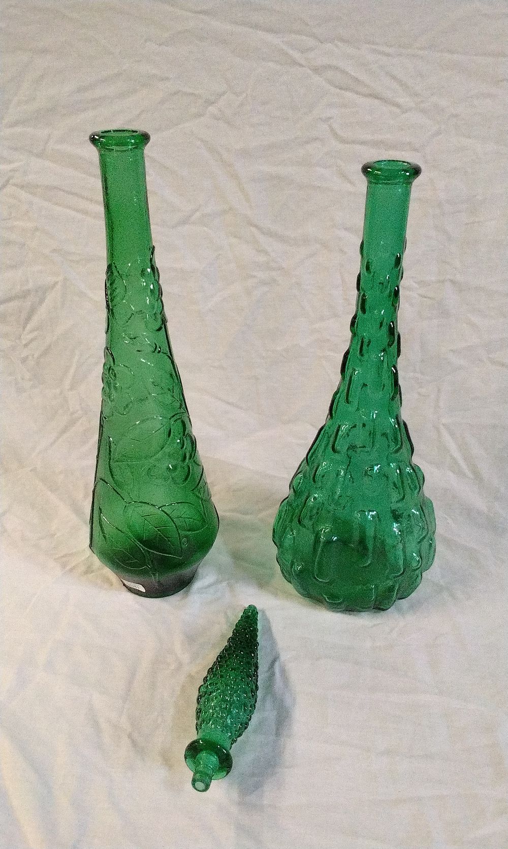 Lot 158: Two Large Green Italian Empoli Genie Bottles/Decanters with One Stopper
