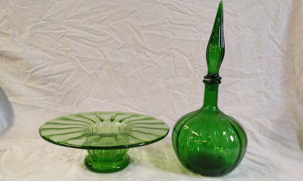 Lot 170: A Green Glass Empoli Onion Genie Bottle and a 1930's Stuart Green Lead Glass Wide Rimmed Flower Bowl/Posy Vase