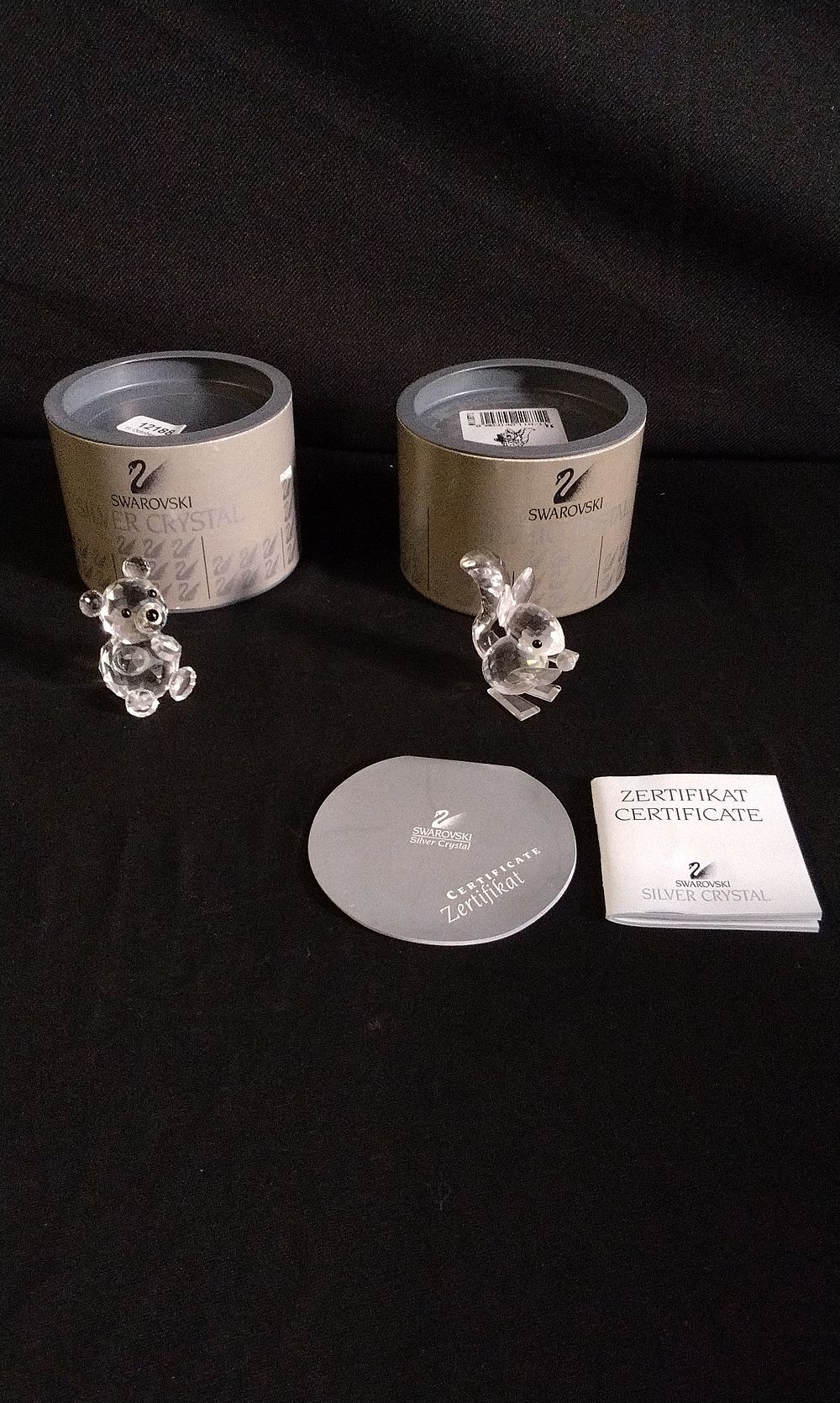 Lot 236: Two Boxed Swarovski Miniature Animals