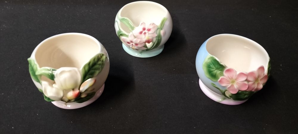 Lot 296: Three Franz Porcelain Tea light Holders