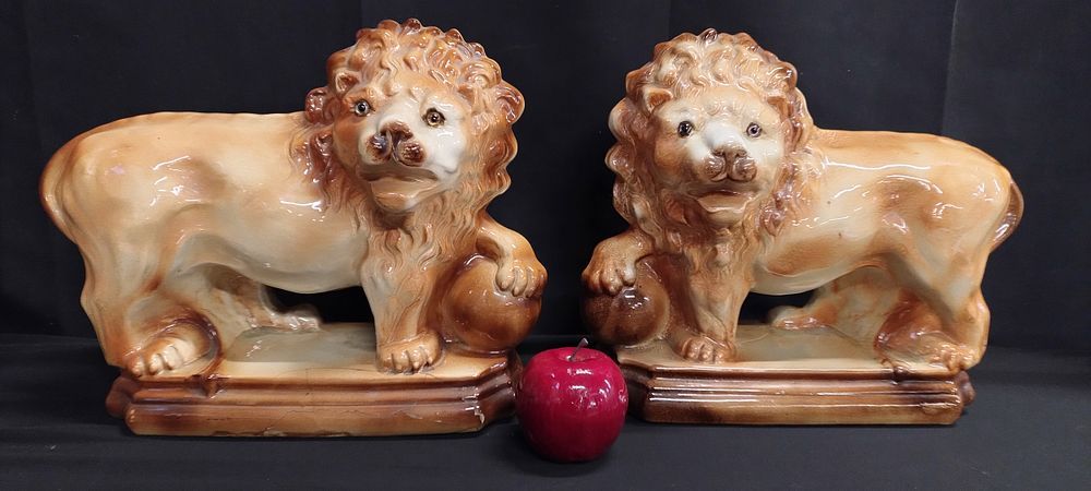 Lot 301: Pair of Victorian Staffordshire ceramic fireplace lions. Measures...